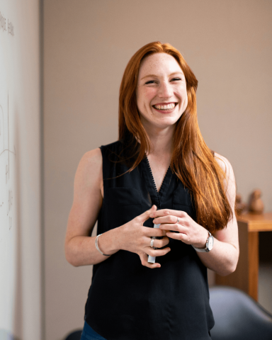 red headed young woman smiling
